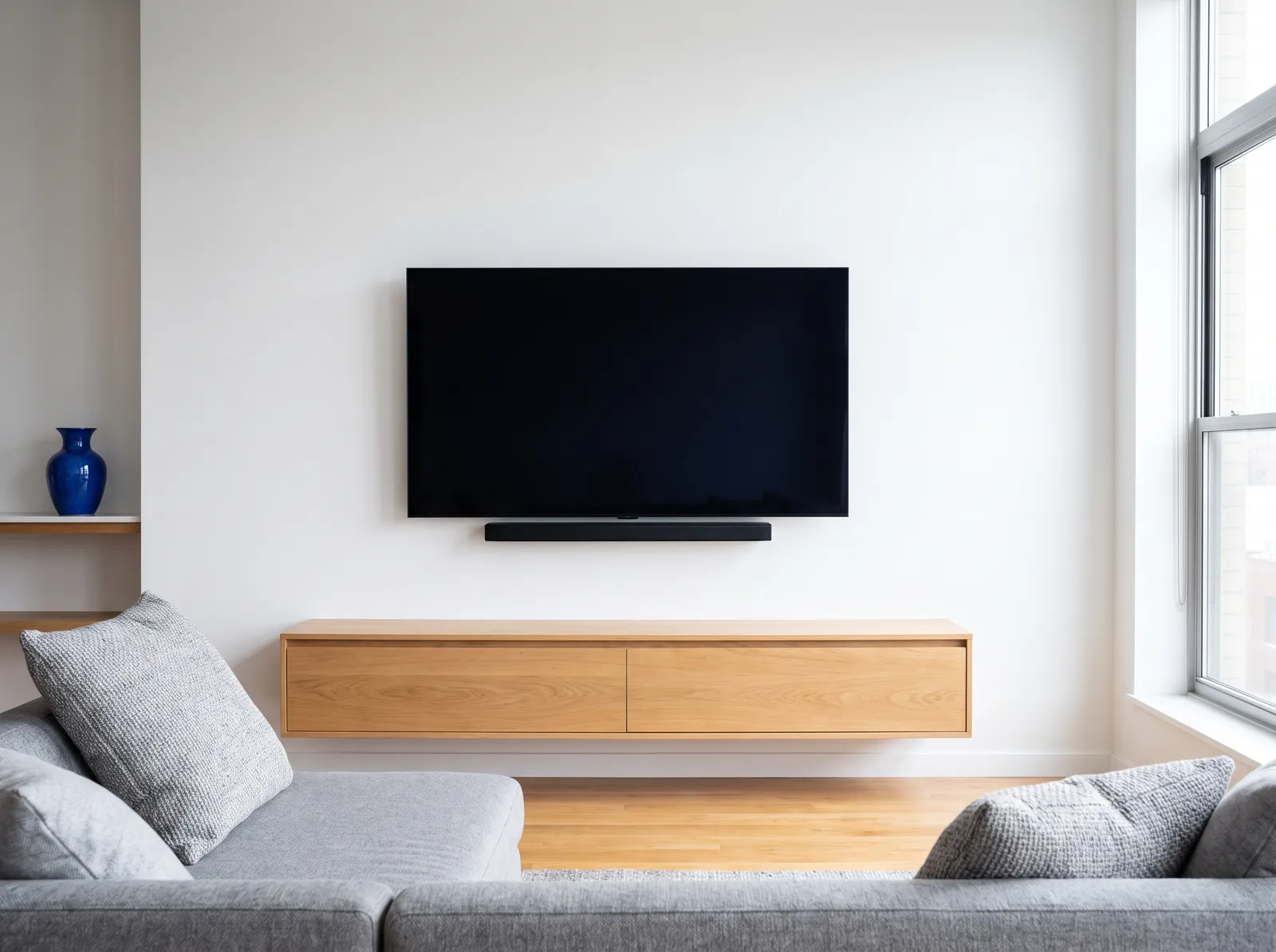 Media wall with TV and soundbar and no visible wires